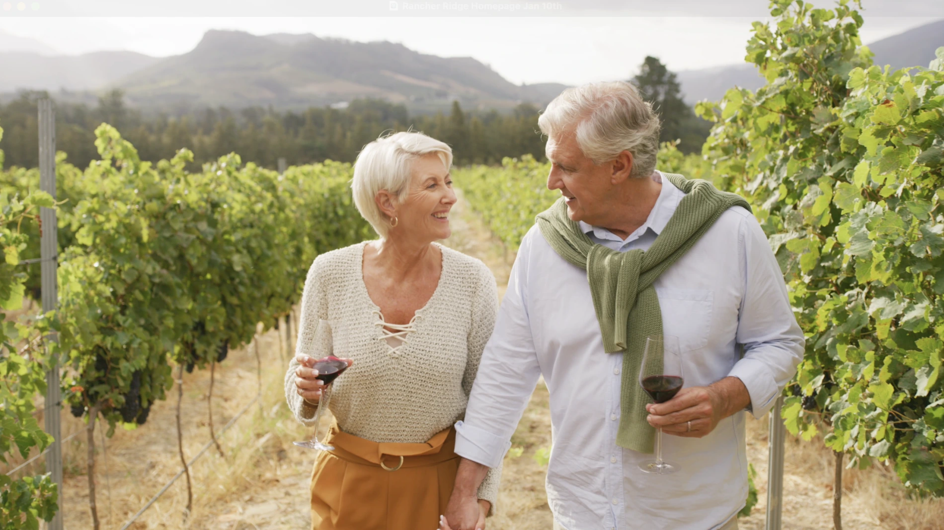 retired couple walking through winery