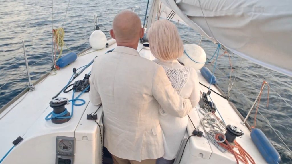 retired couple on sailboat